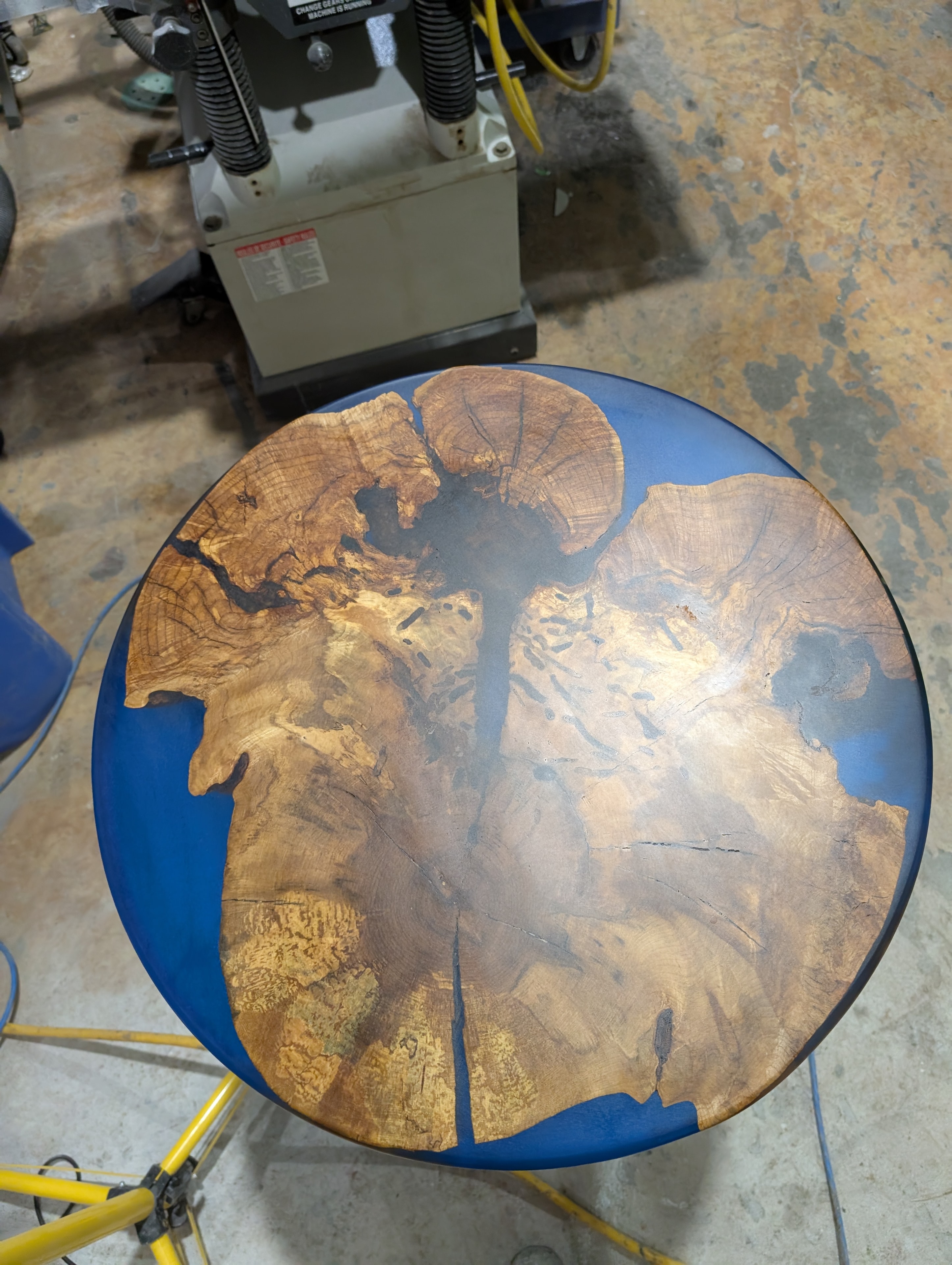 Live edge walnut black epoxy river coffee table — natural grain detail