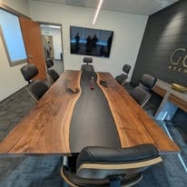 Live edge walnut black epoxy river conference table — alternate angle at Goose Mechanical Calgary