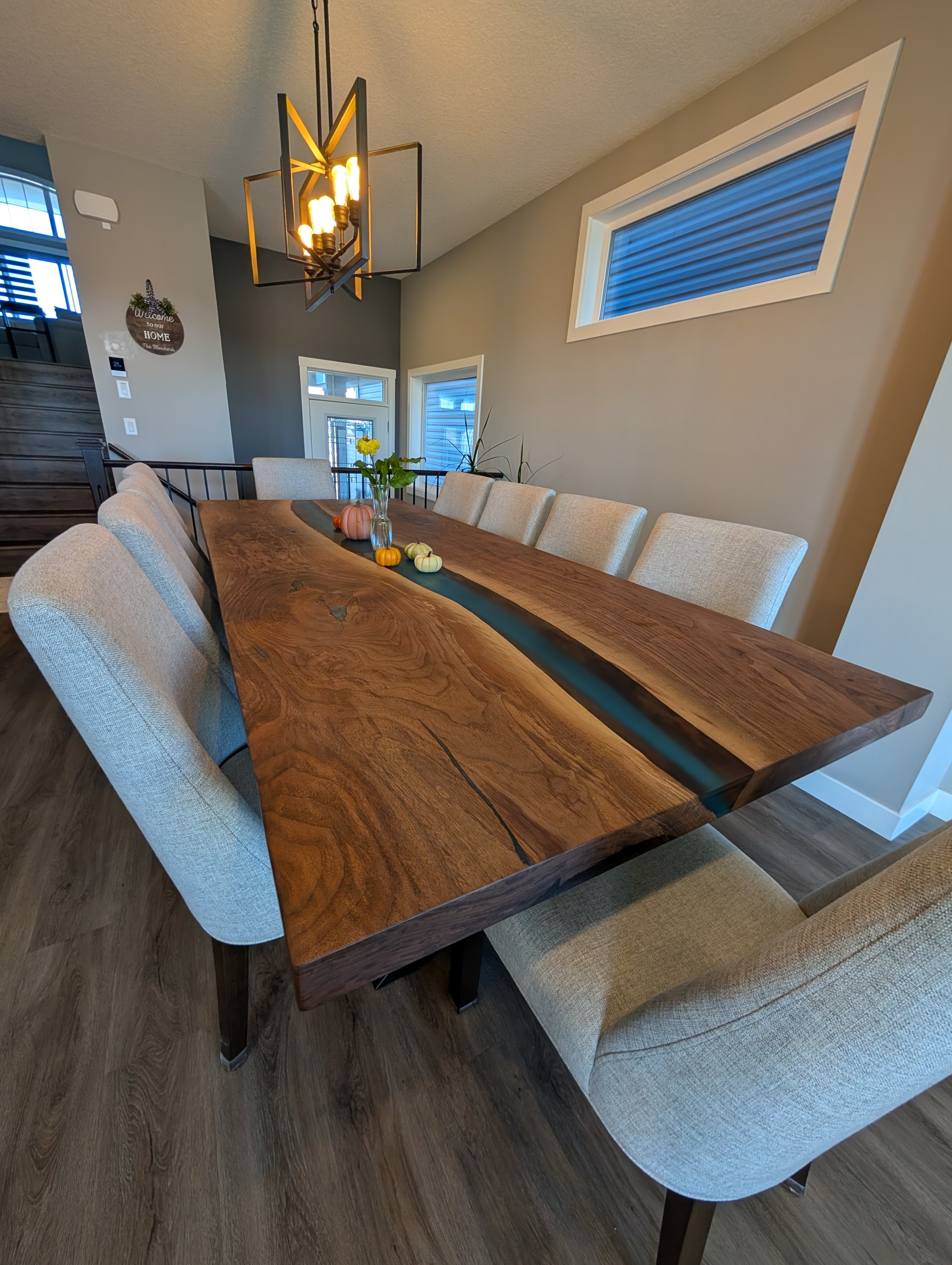 Live edge walnut black epoxy river dining table