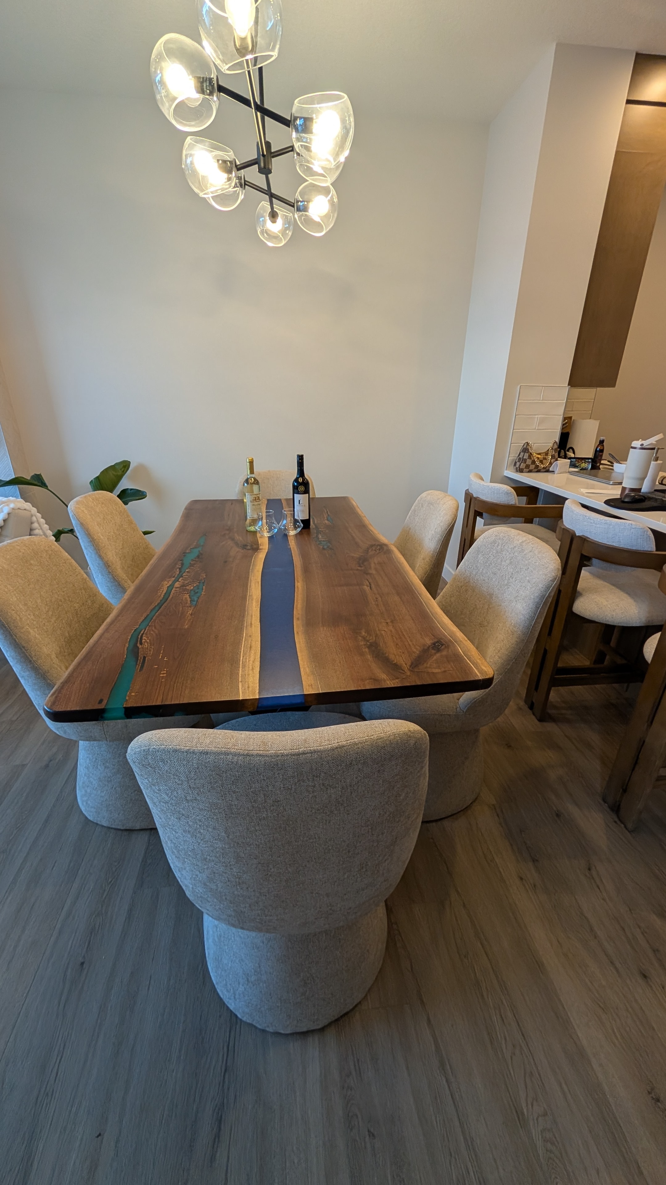 Live edge walnut black epoxy river dining table