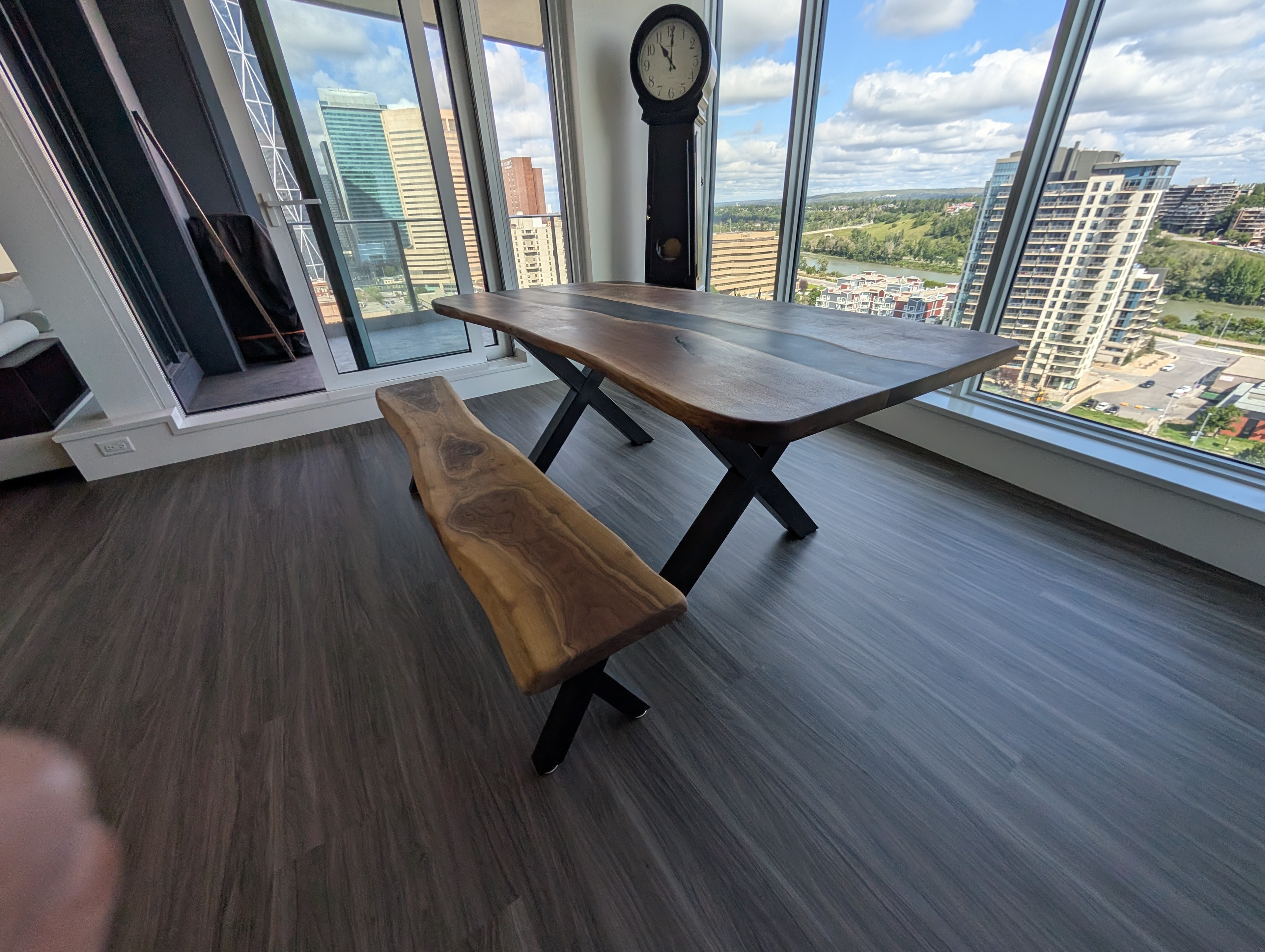 Custom live edge walnut dining table in Calgary highrise