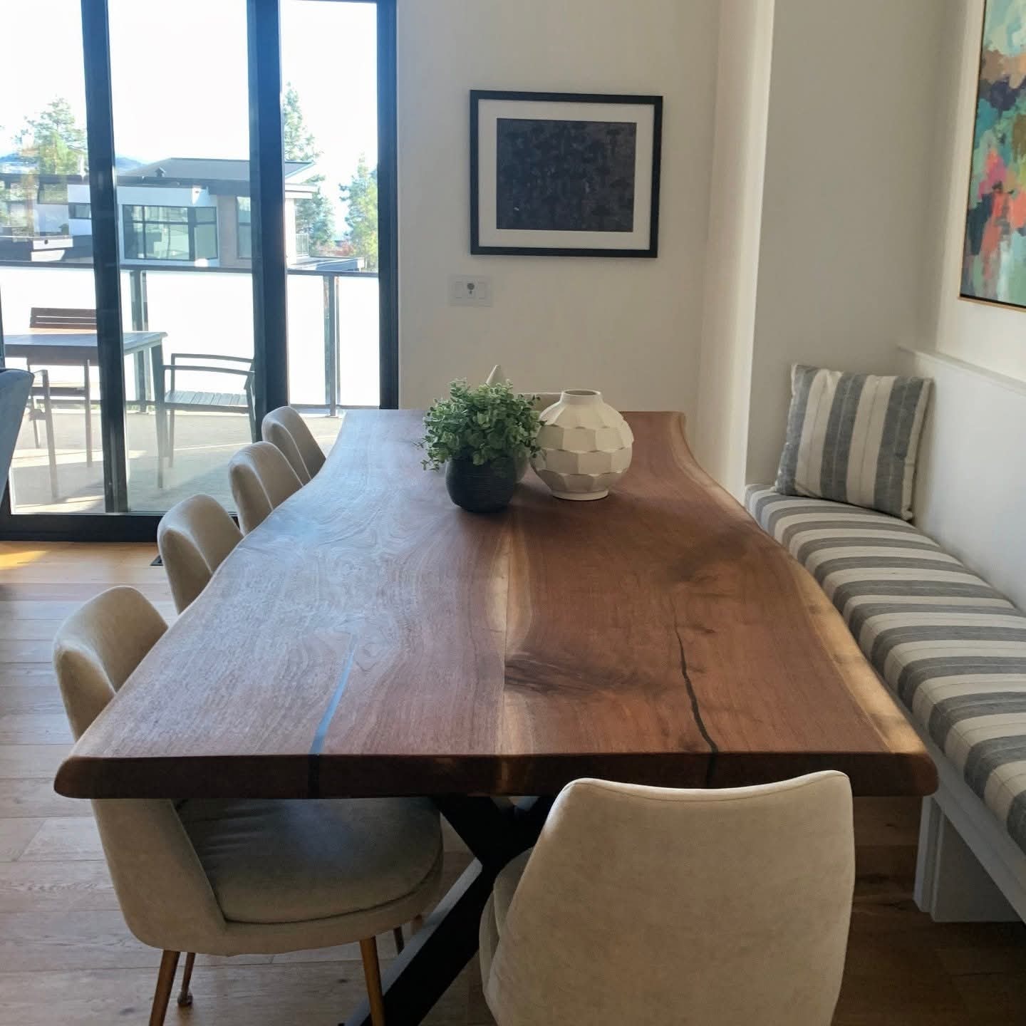 Live edge walnut dining table with blue epoxy fills — Calgary