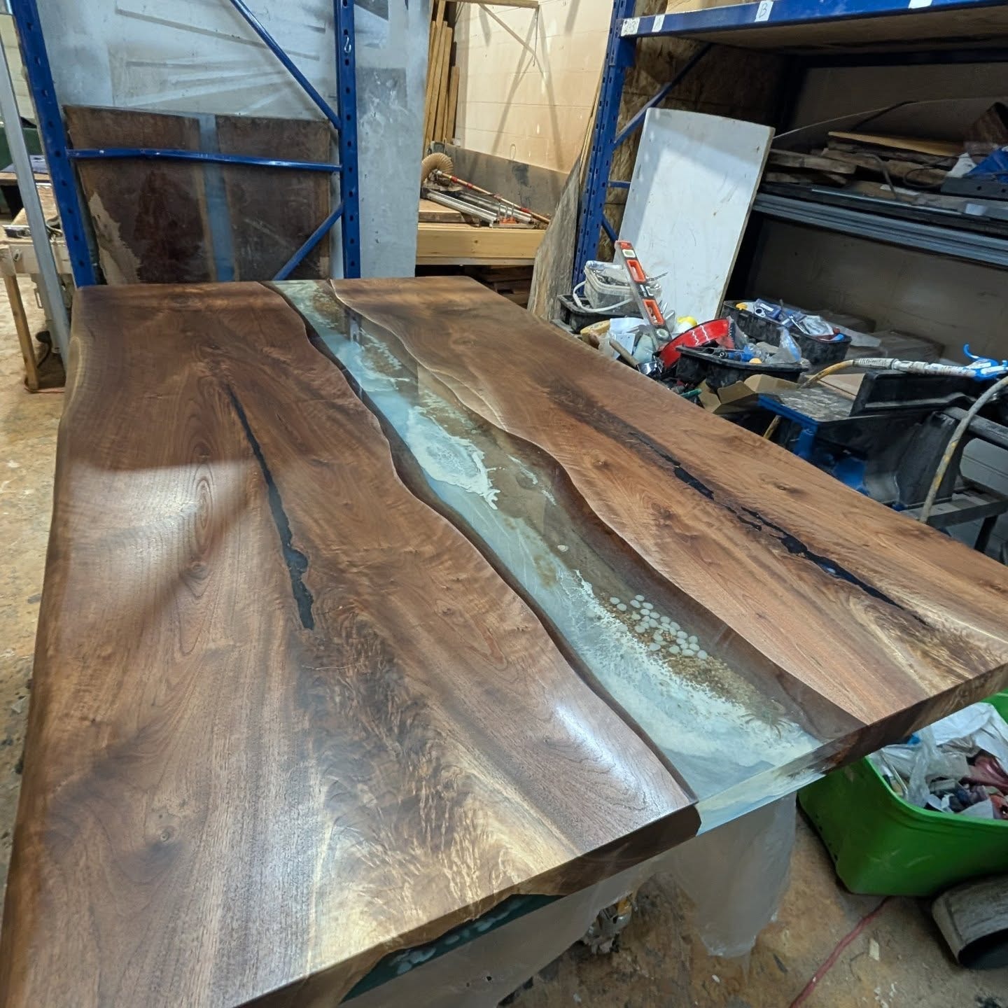 Live edge walnut black epoxy river dining table with U-base — Valentine's Day styled Calgary home kitchen