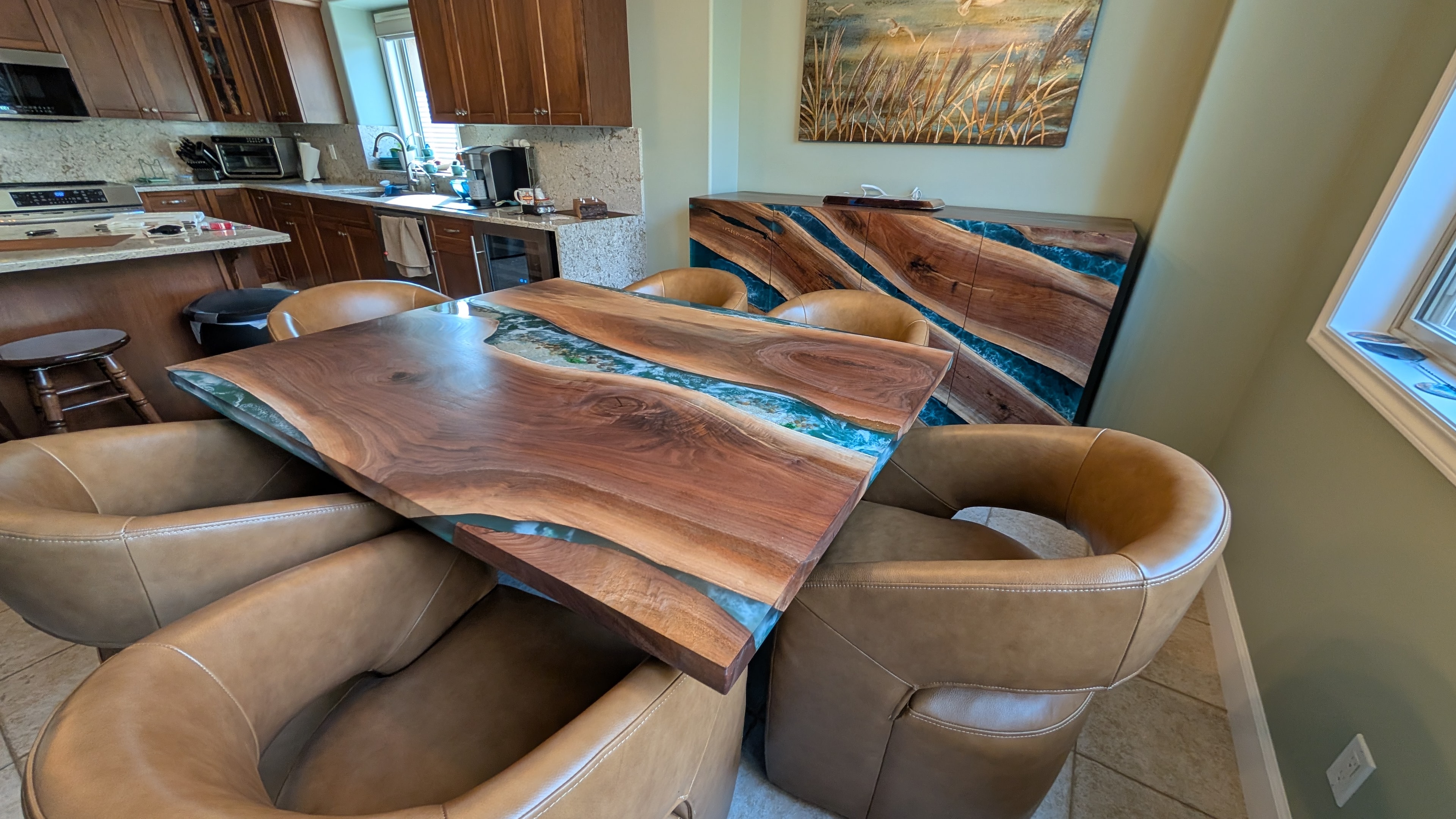 Triple-slab live edge walnut clear metallic epoxy river table in progress — overhead shop view at Calgary Wood Works