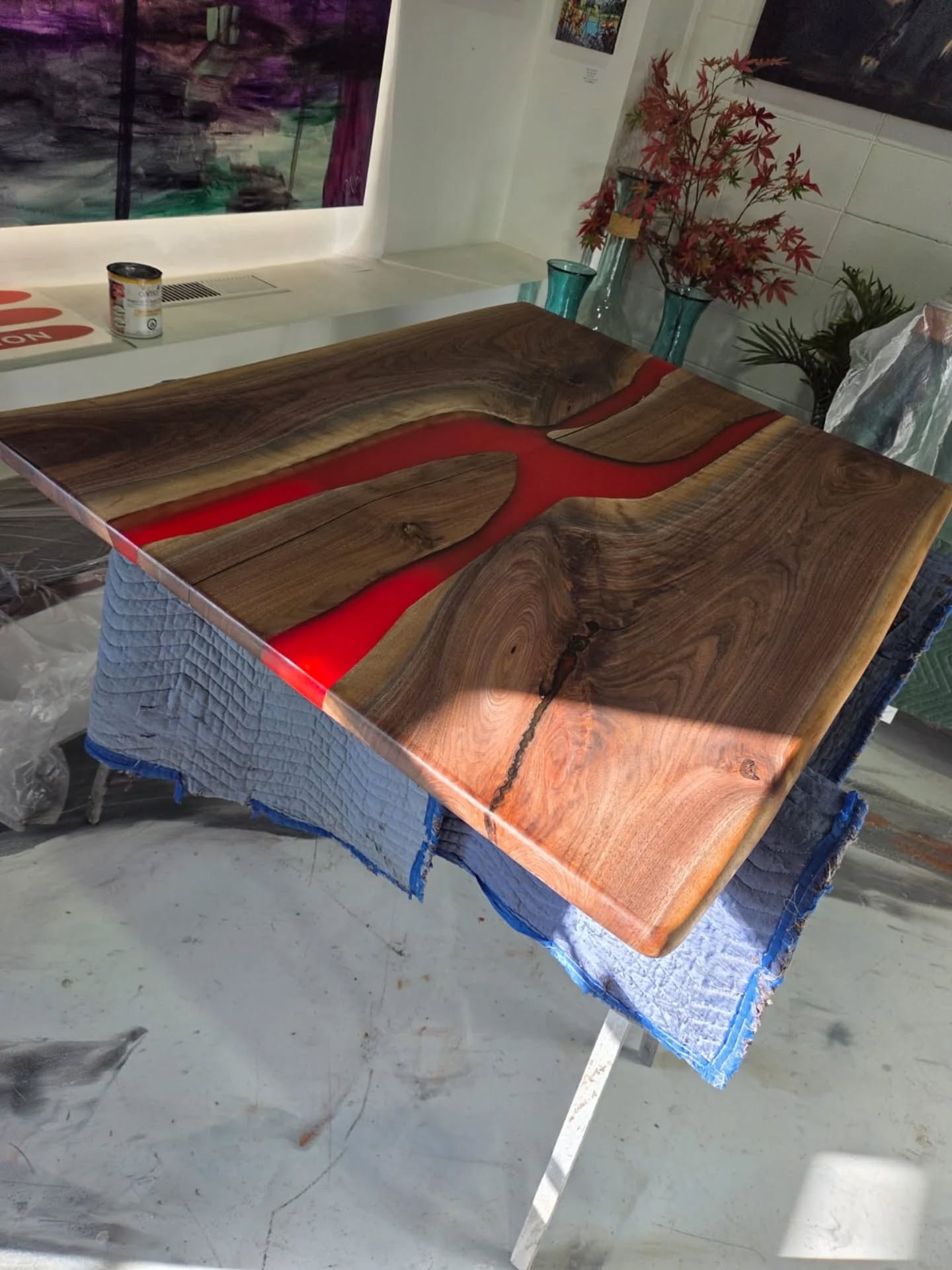 Bookmatched live edge walnut red epoxy river dining table in progress — Calgary Wood Works shop